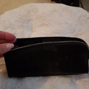 Furla lined black leather makeup bag